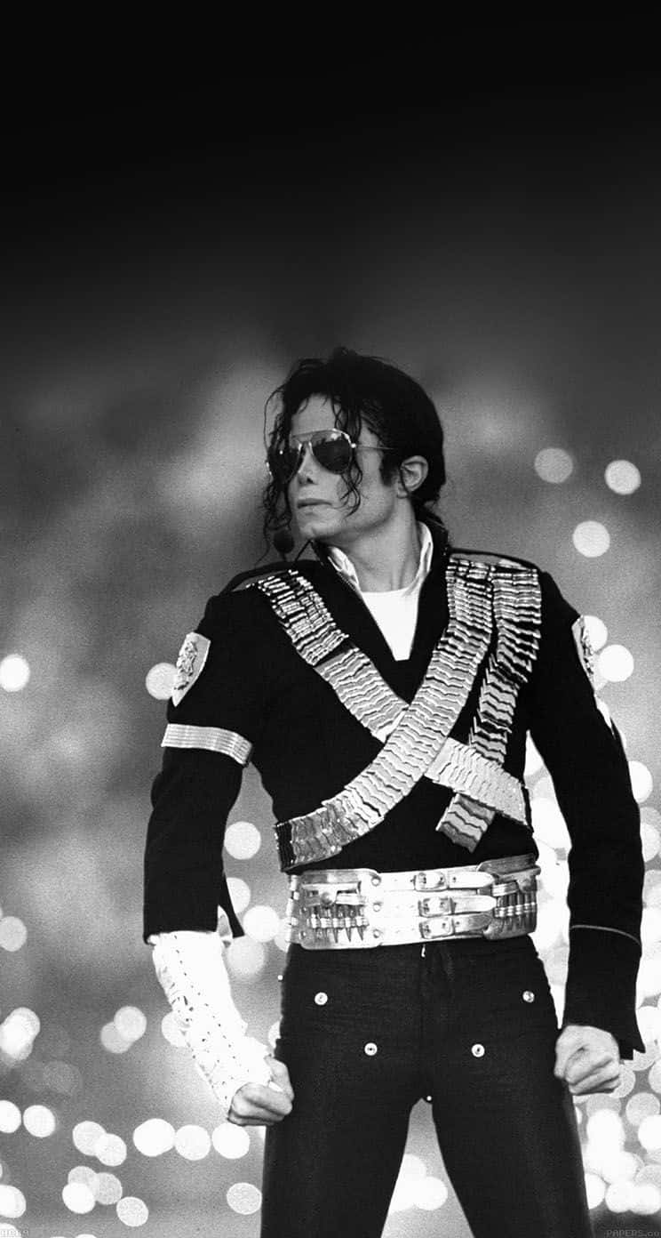 Enjoy Your Favorite Songs By Michael Jackson On Your Iphone Background