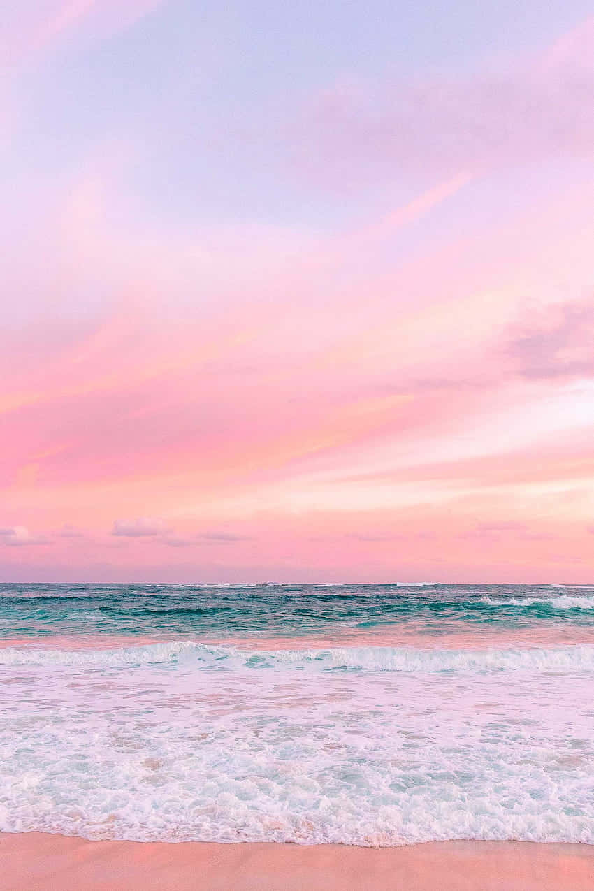 Enjoying A Calm And Pastel-hued Beach Background