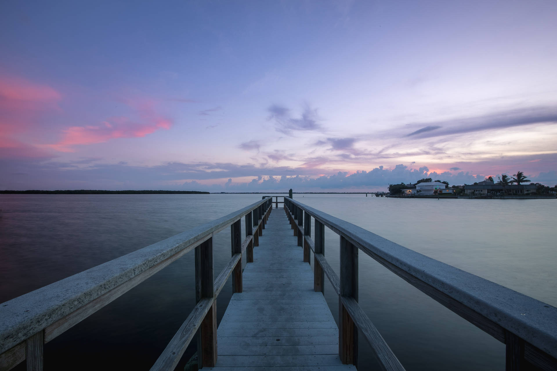 Enjoying A Serene View Of A Bridge Under A Beautiful Sky Background