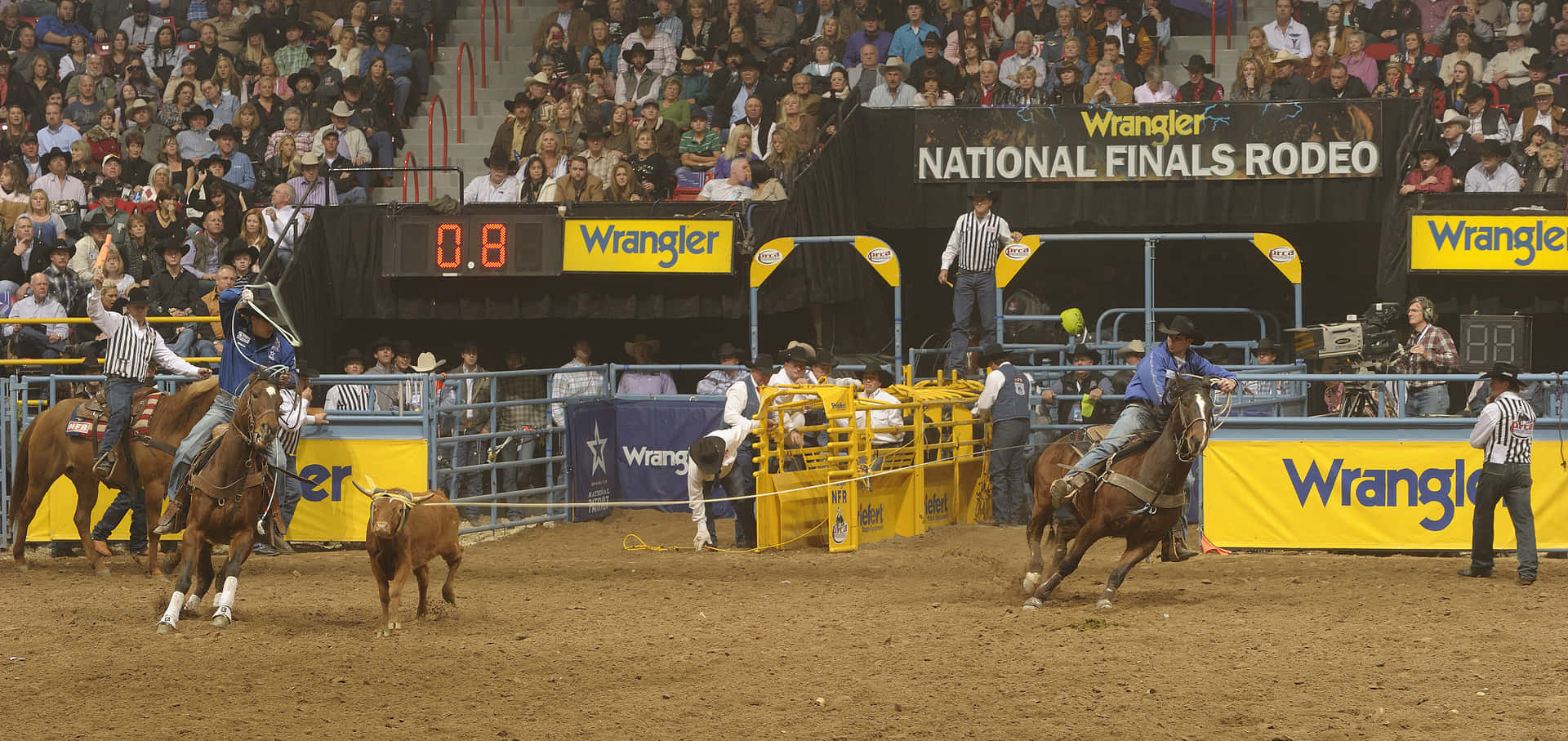 Enjoying Some Friendly Competition At The Team Roping Event. Background