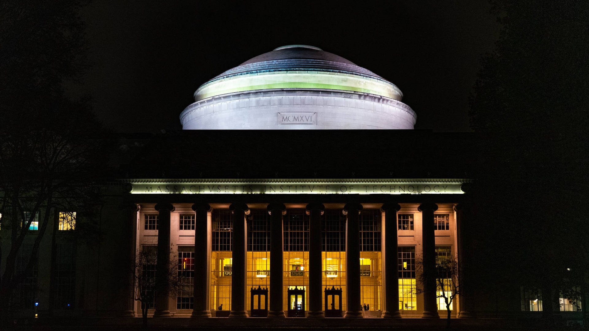 Enlightened Knowledge - The Great Dome Of Mit Under Starry Night Background