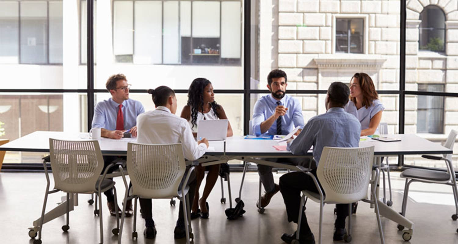 Enterprise Company Employees In A Meeting