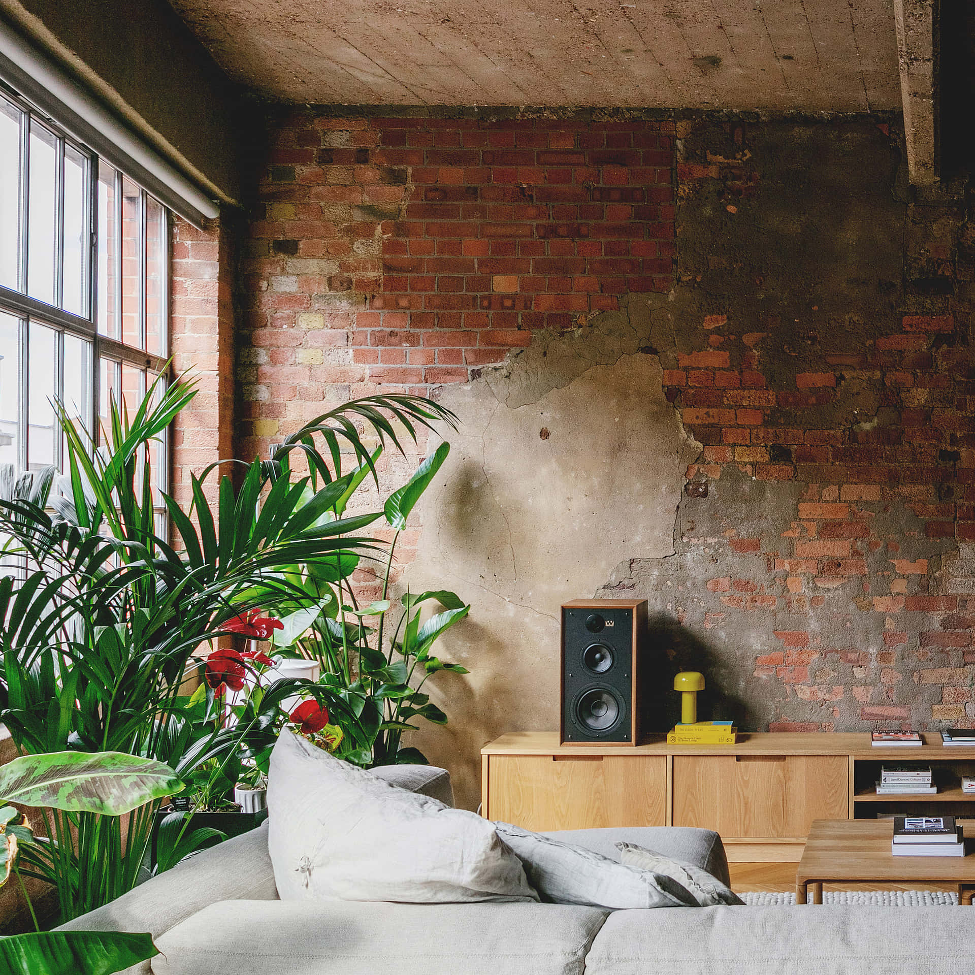 Entertainment Room With Exposed Wall