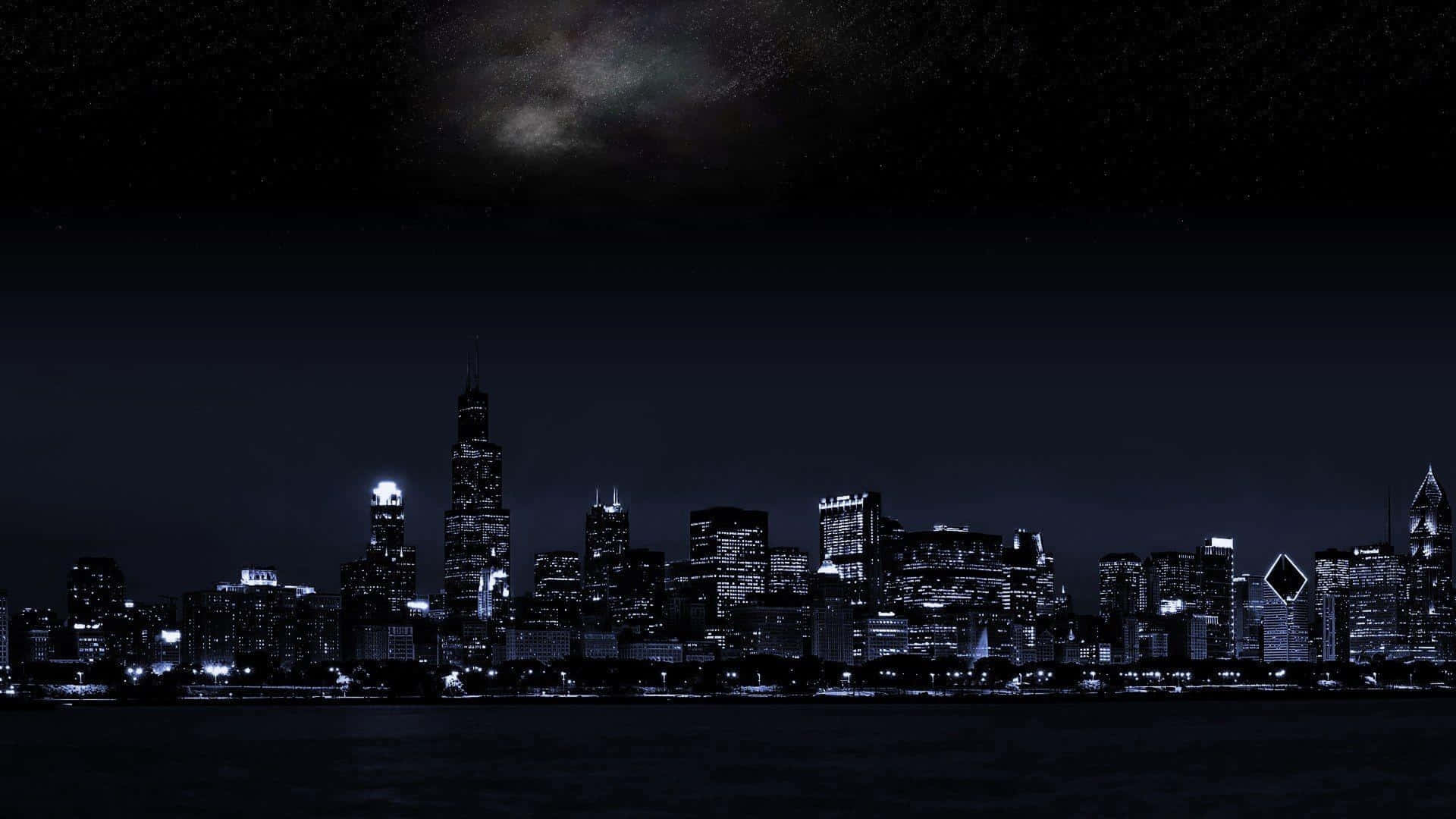 Enthralling Night View Of A Dark City Background