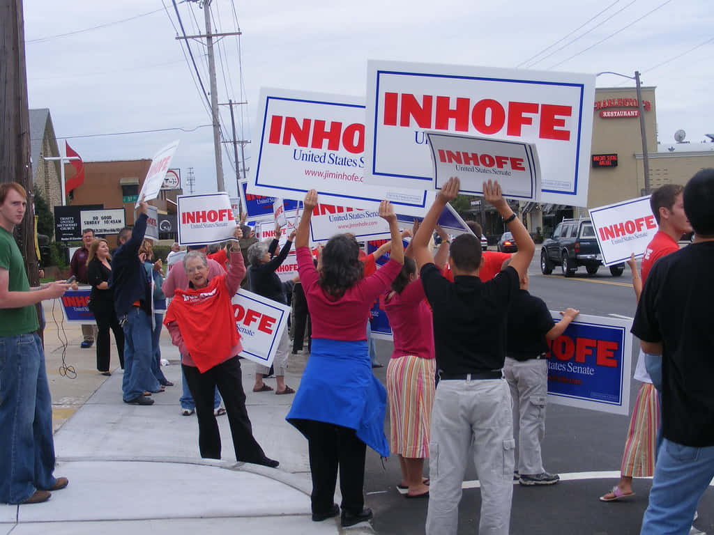 Enthusiastic Crowd Supporting Senator Jim Inhofe Background