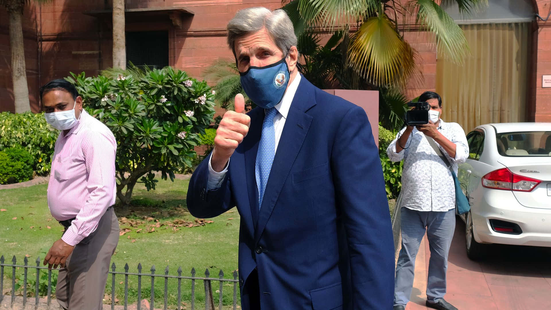Enthusiastic John Kerry Giving A Thumbs Up Background
