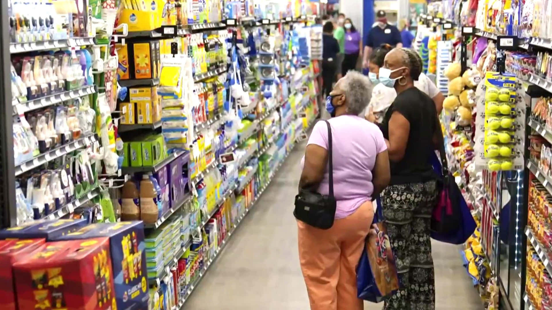 Enthusiastic Shopper At A Retail Store Background