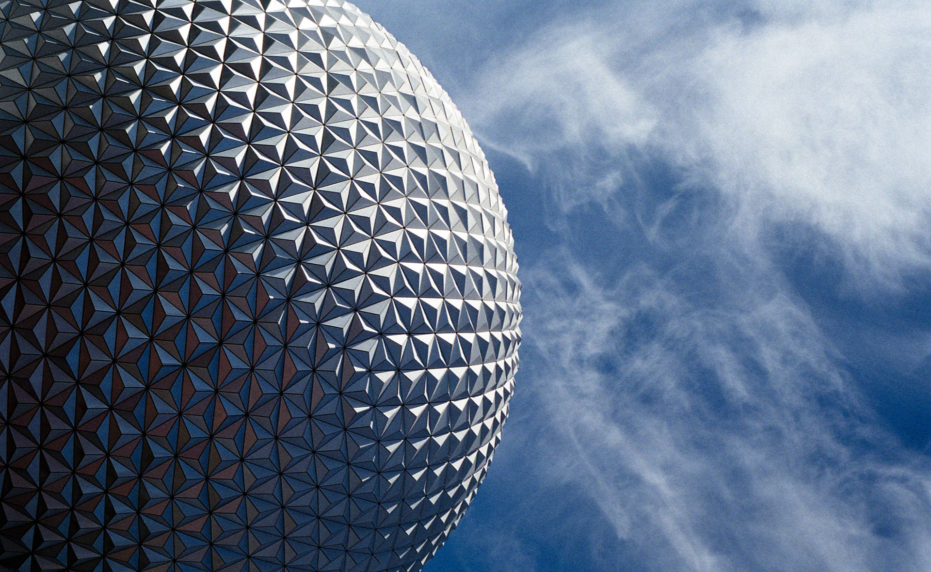 Epcot Globe With Wispy Clouds Background