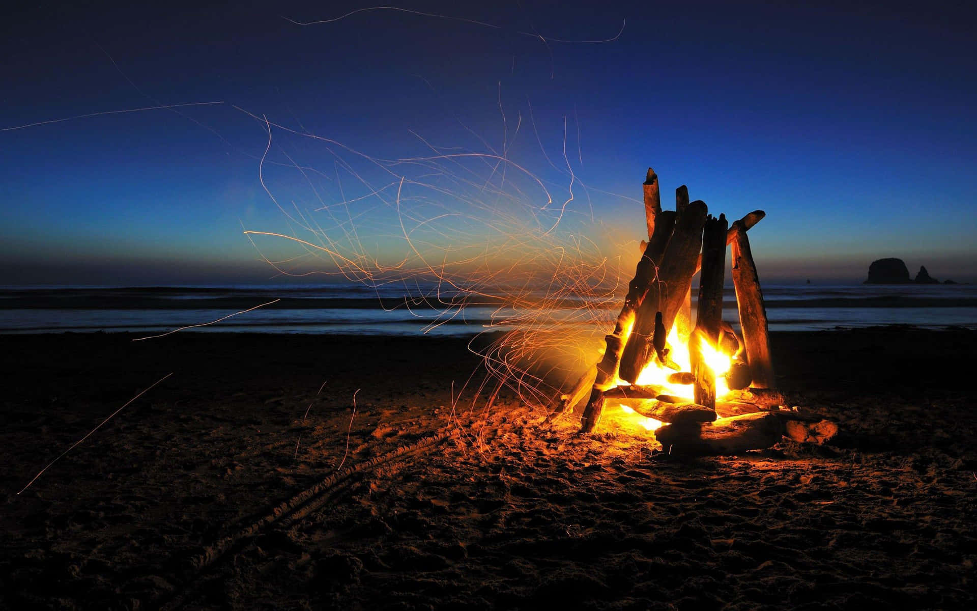 Ephemeral Moments By The Beach Bonfire Background