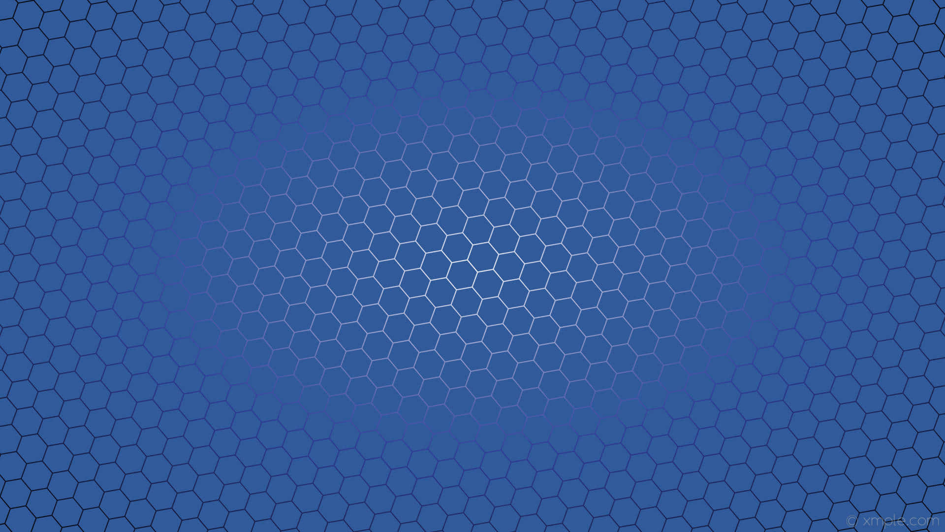 Epic Aerial View Of A Stunning Mountain Landscape Under A Clear Blue Sky.