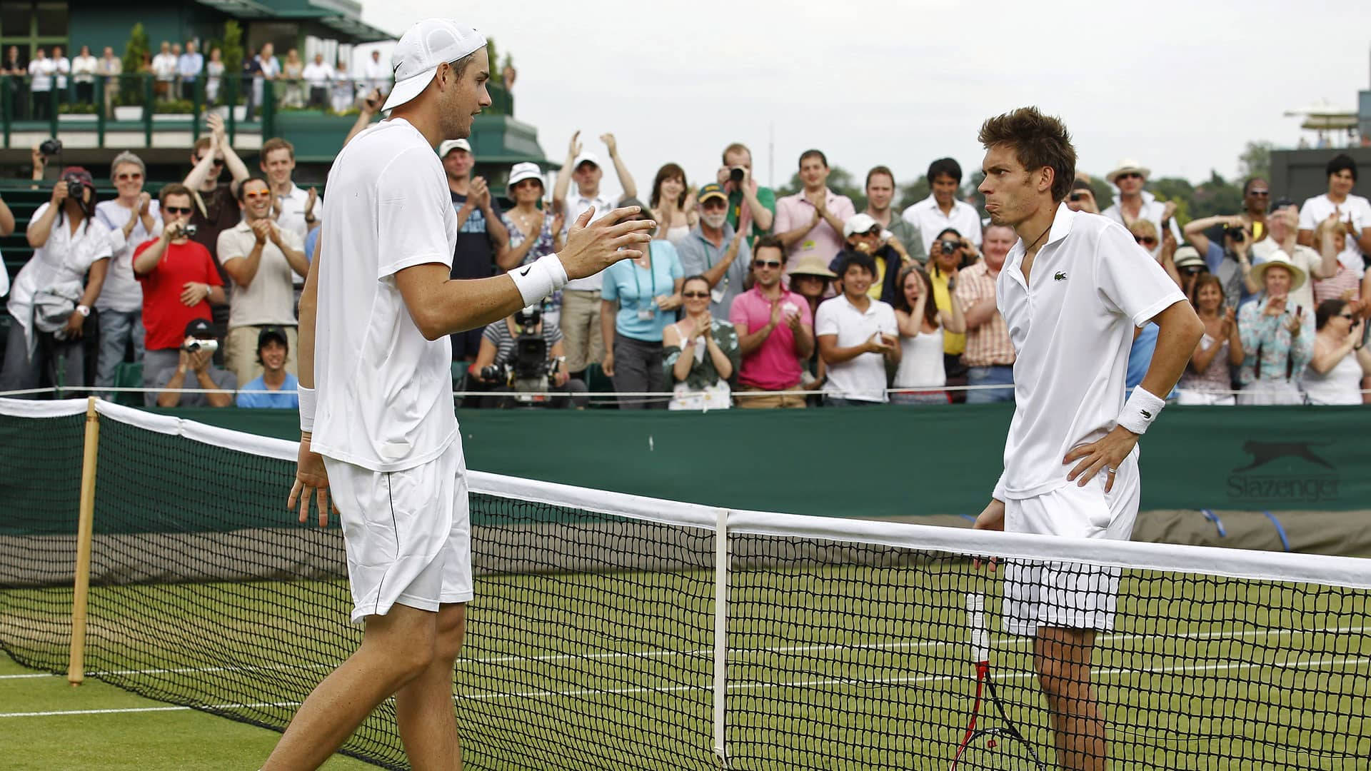 Epic Encounter: Nicolas Mahut Vs. John Isner At Wimbledon Background