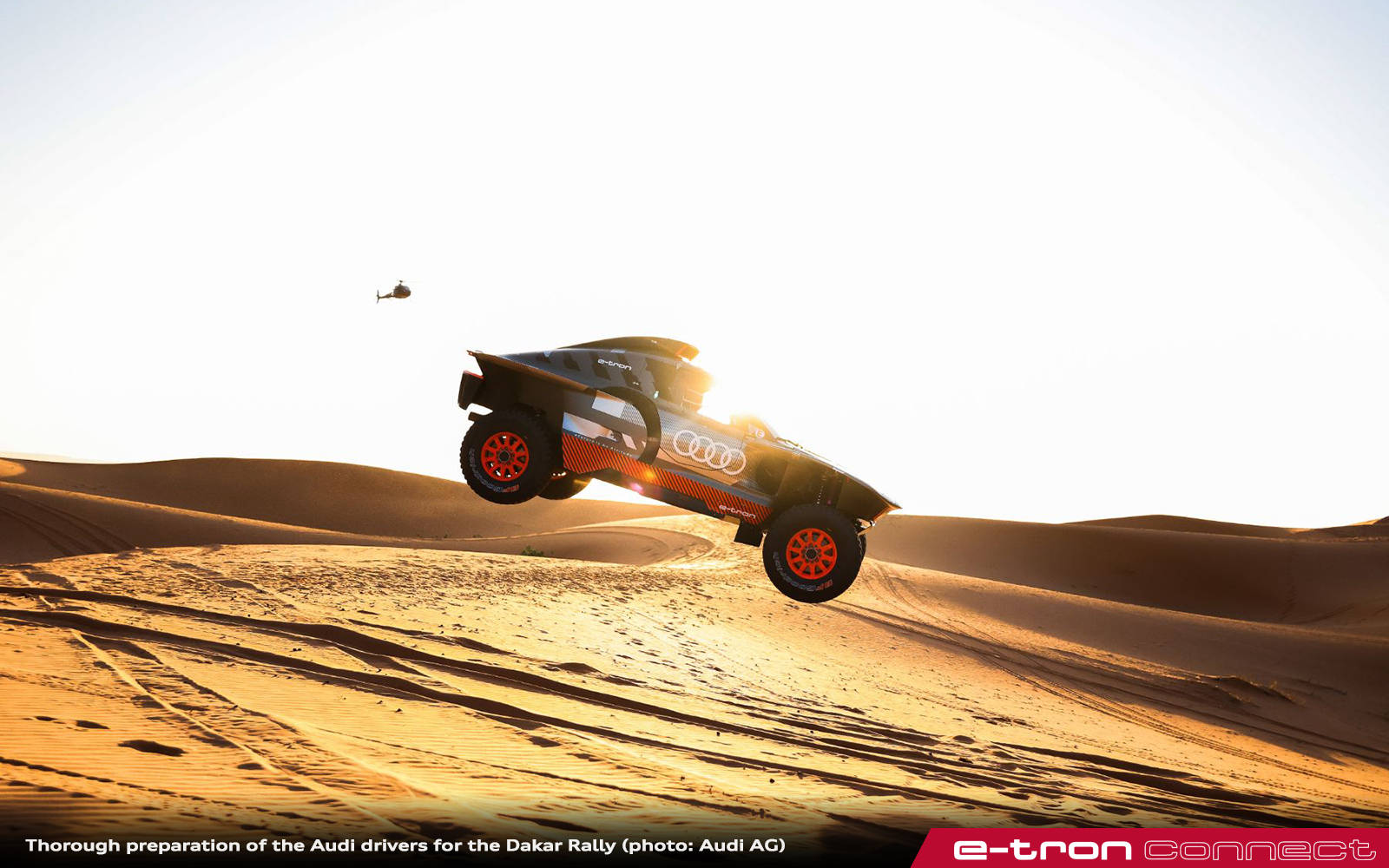 Epic Leap Over Sand Dunes Background