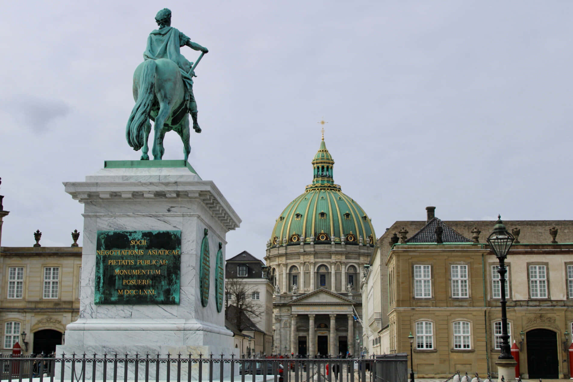 Equestrian Statue In The Heart Of Amalienborg Palace Background
