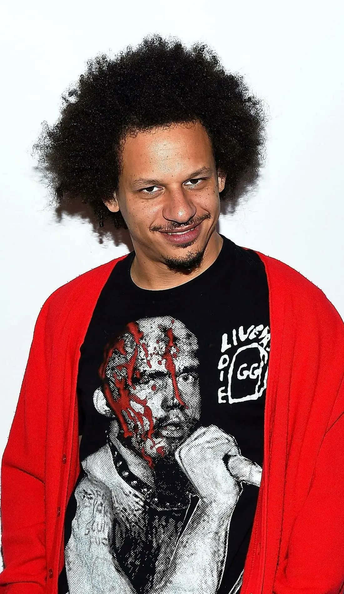 Eric Andre Red Cardigan Smirk