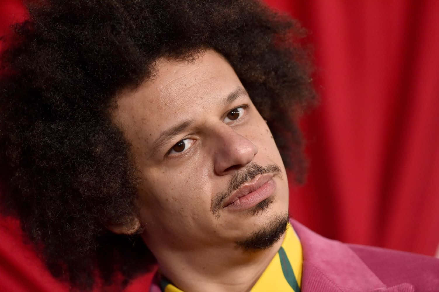 Eric Andre Skeptical Look Background