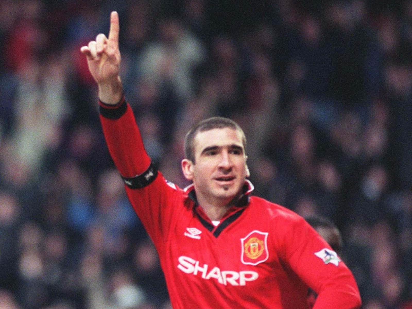 Eric Cantona Hand Signature Pose Background
