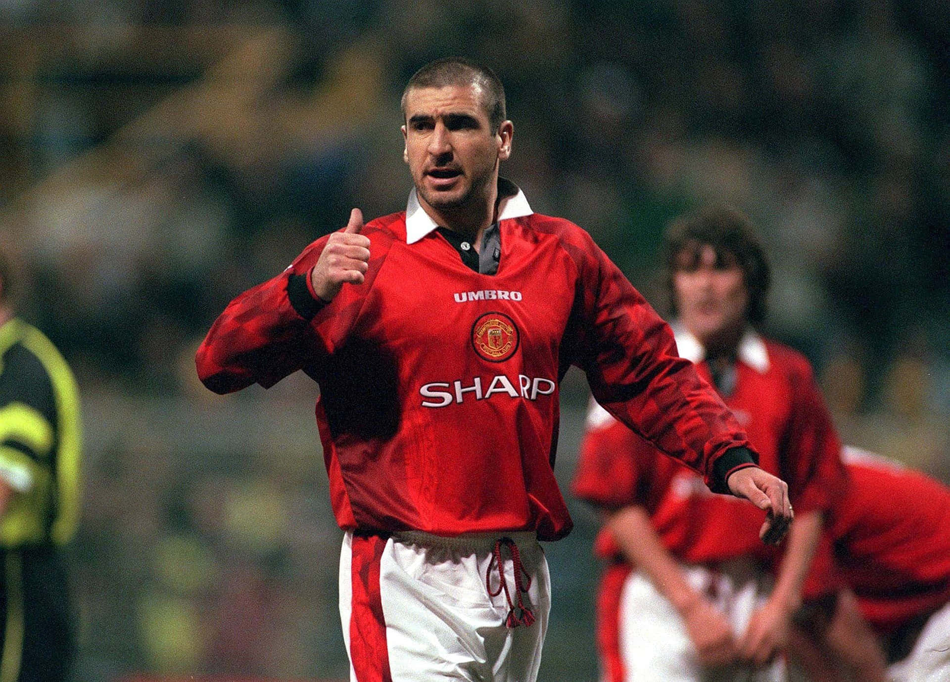 Eric Cantona Thumb Up Background