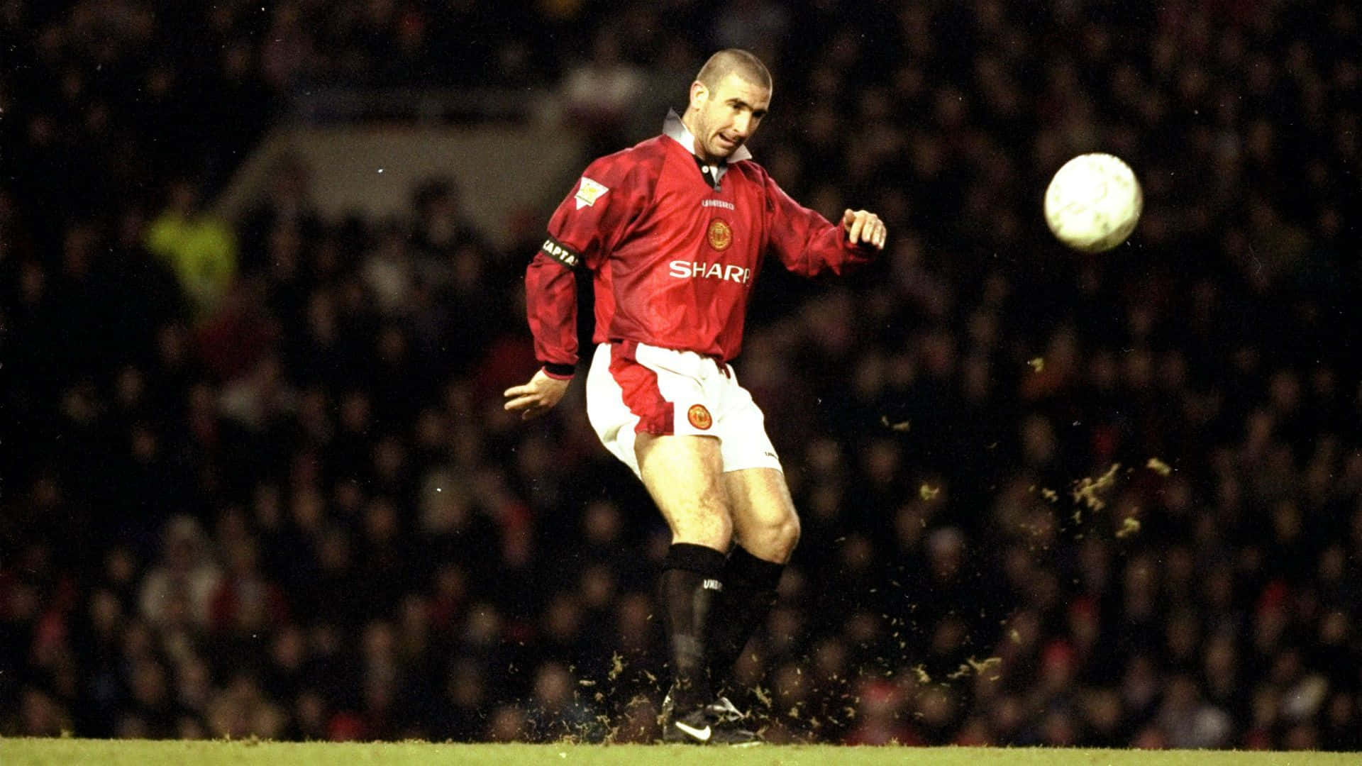 Eric Cantona With Flying Ball Background