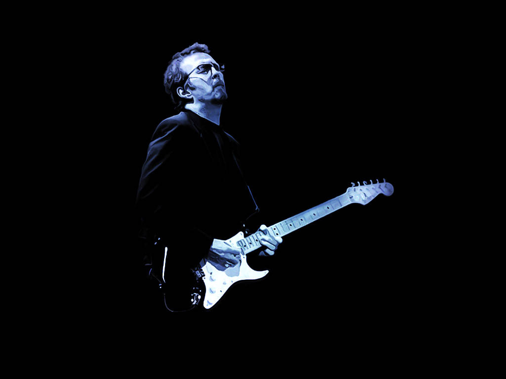 Eric Clapton Illuminated By Blue Stage Lights