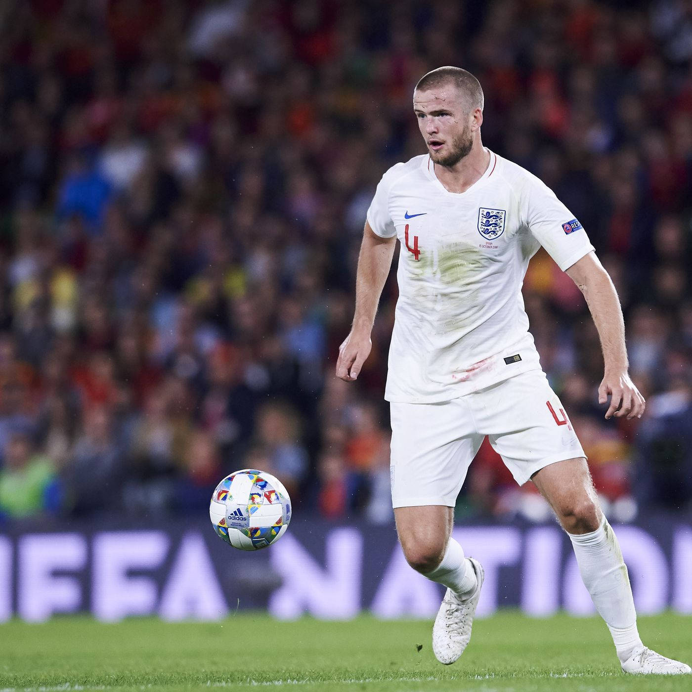 Eric Dier Kicking A Ball Background