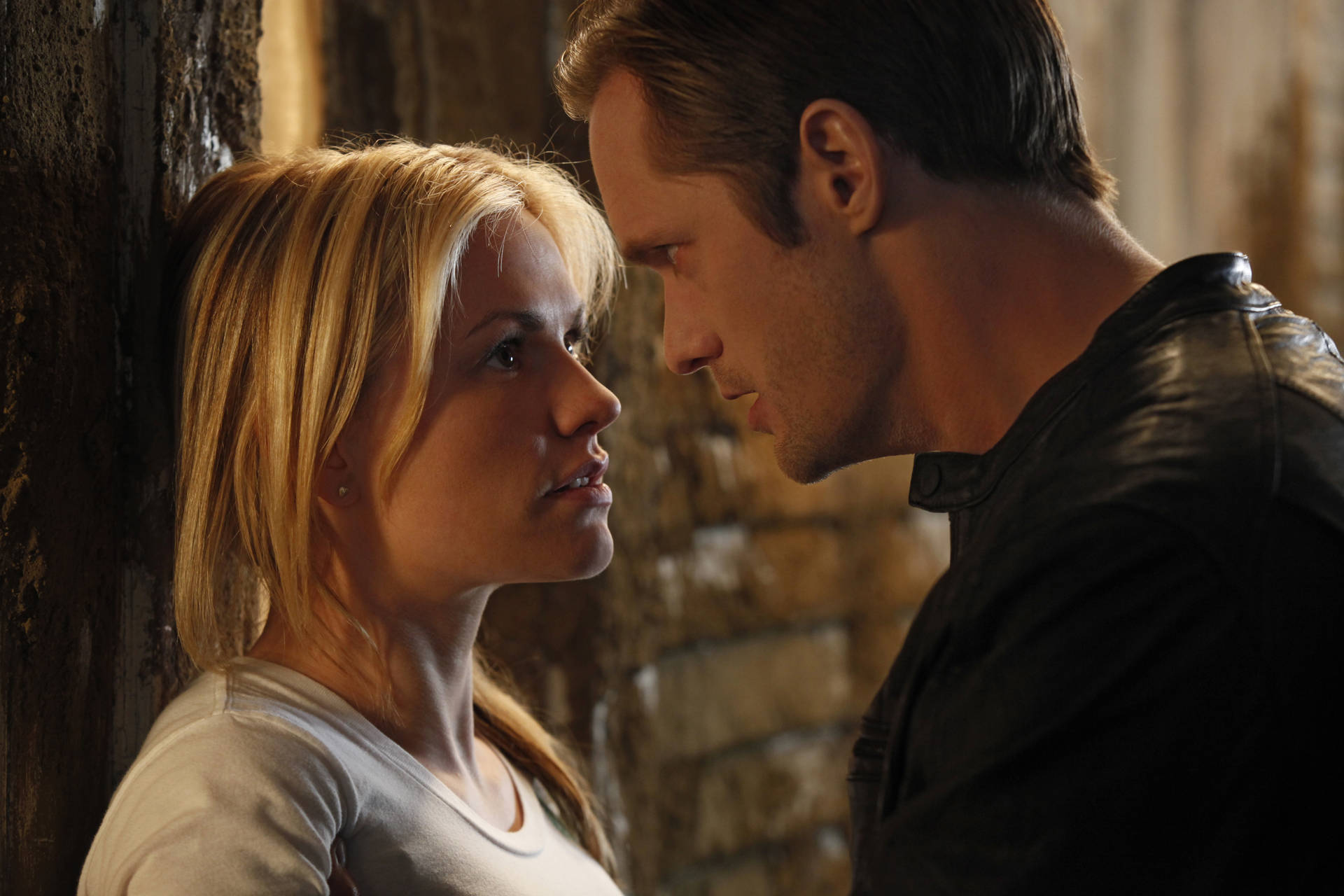 Eric Northman Glaring Intensely At Sookie Stackhouse In True Blood Background