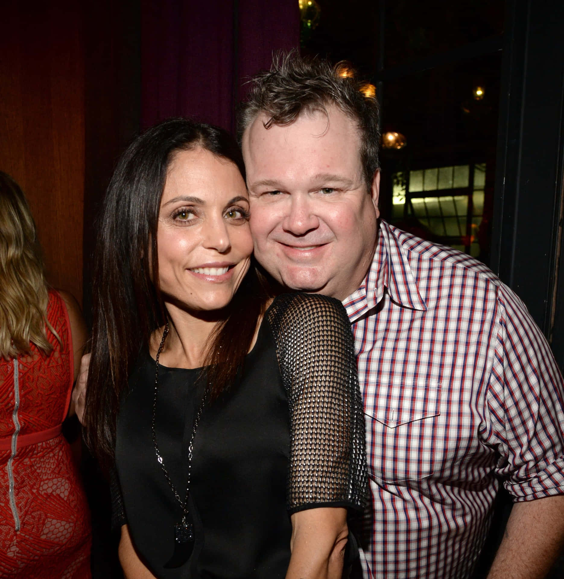 Eric Stonestreet Smiling At Event Background