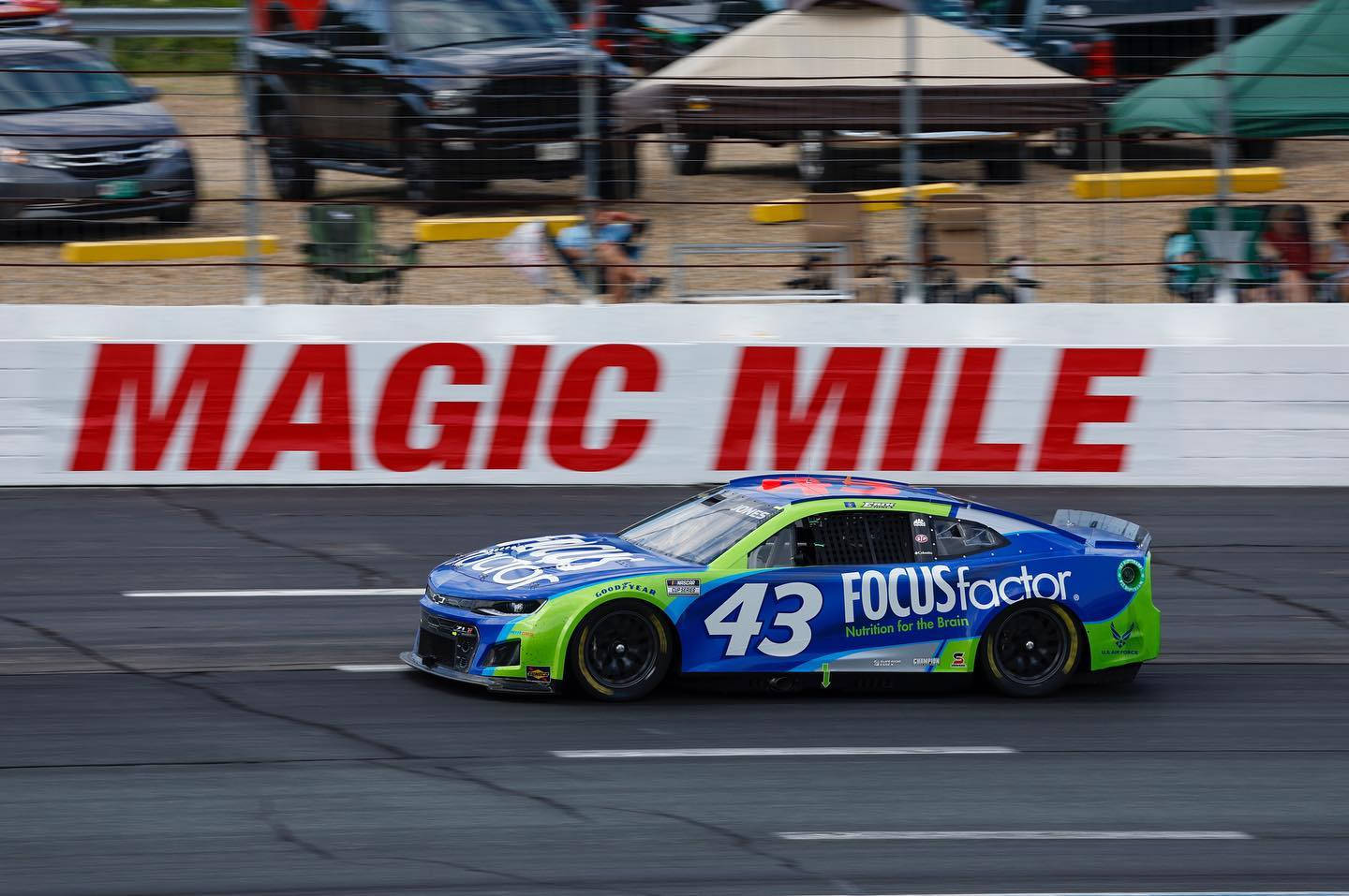 Erik Jone's Blue Car On The Road Background