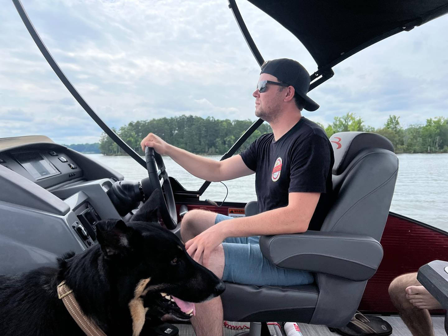 Erik Jones In A Yacht Background