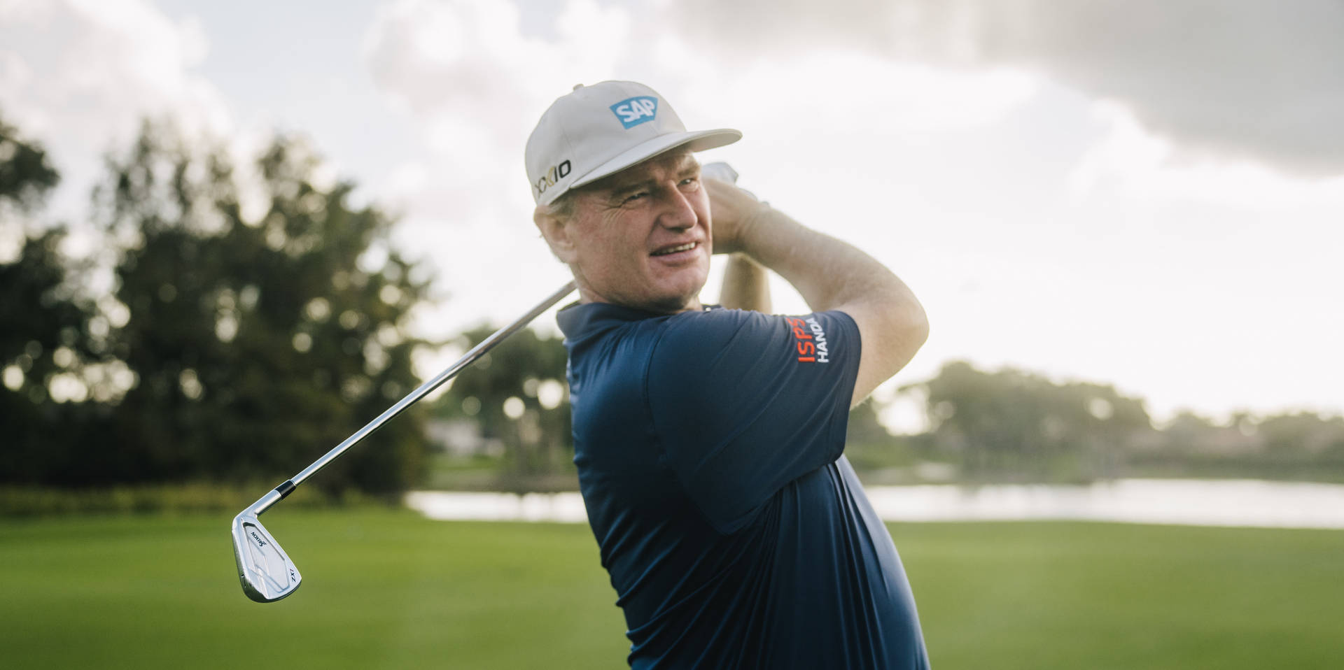 Ernie Els At A Golf Course Background