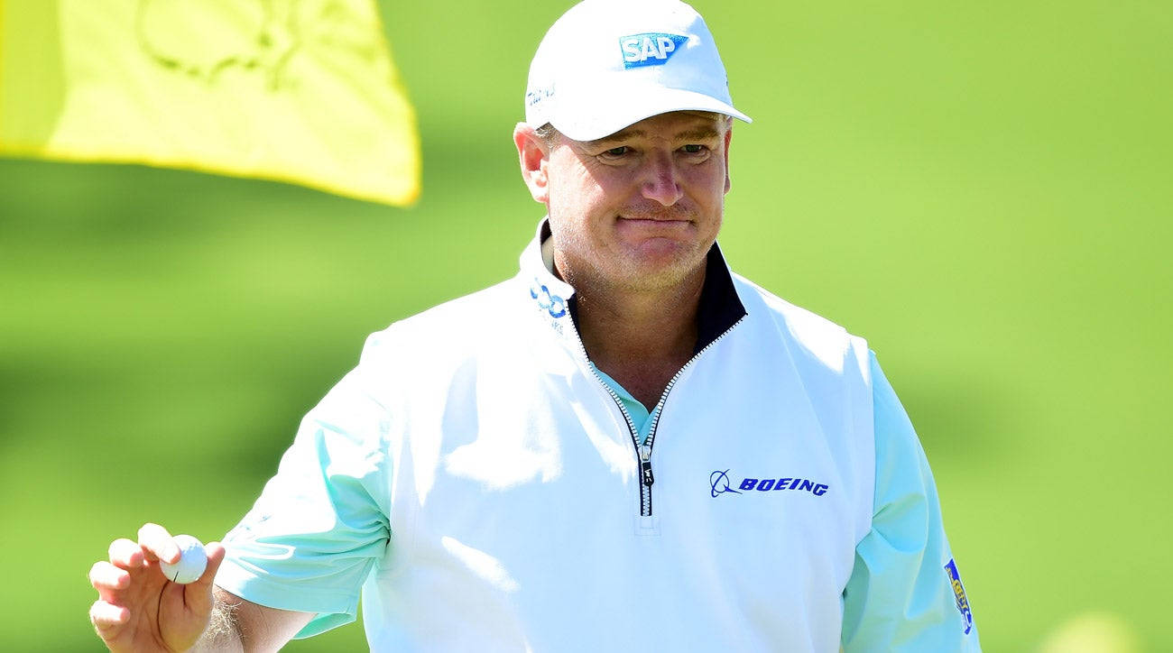 Ernie Els Posing With A Golf Ball Background