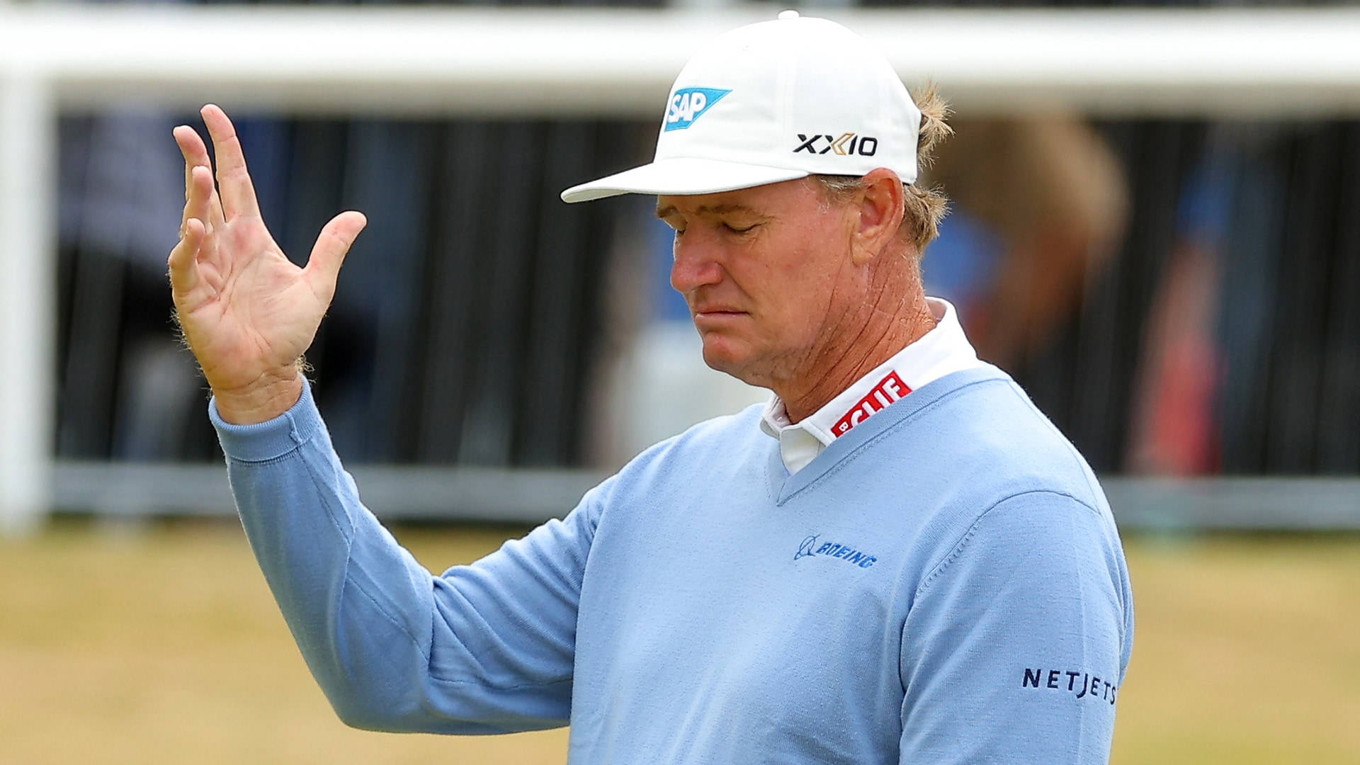 Ernie Els With Right Hand Raised Background