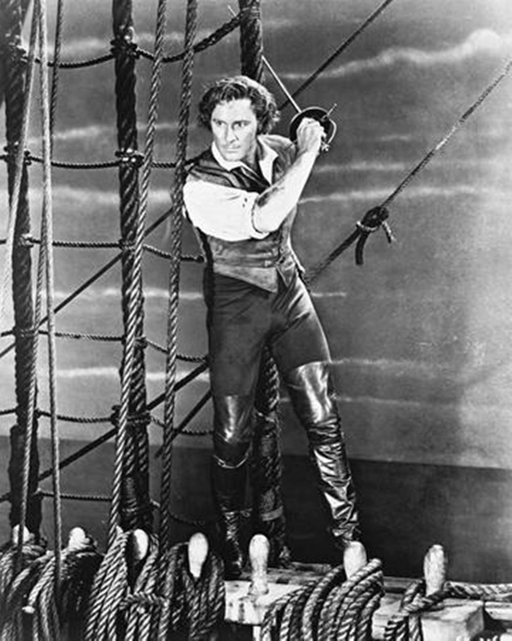 Errol Flynn Holding Sword On Ship