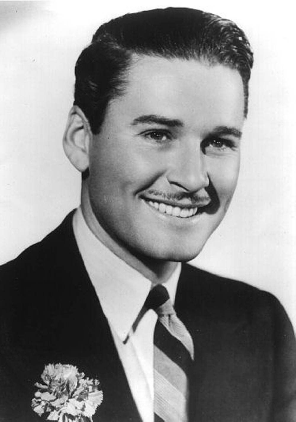 Errol Flynn Smiling In Suit Black And White Background