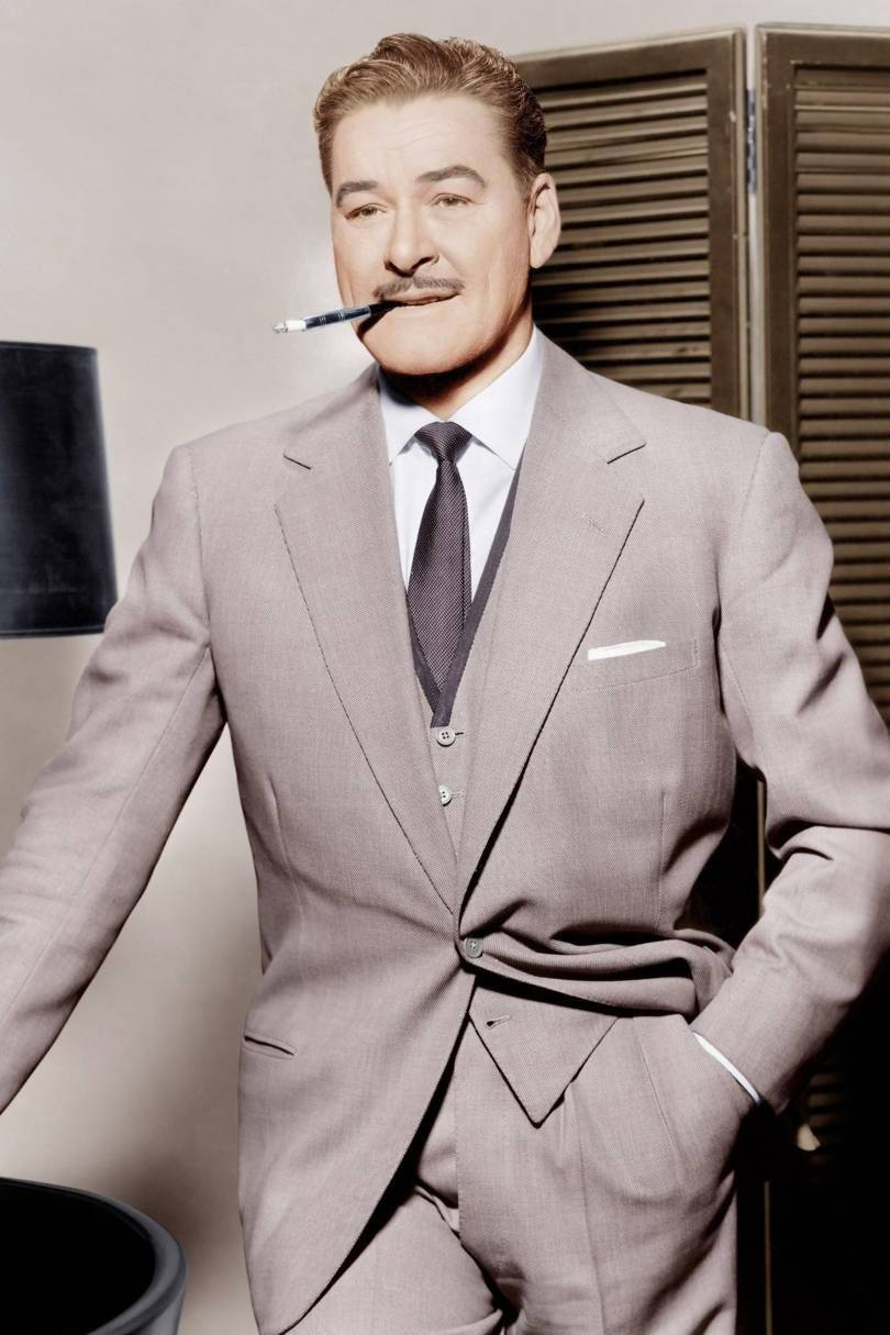 Errol Flynn Smoking Cigarette In Suit Background