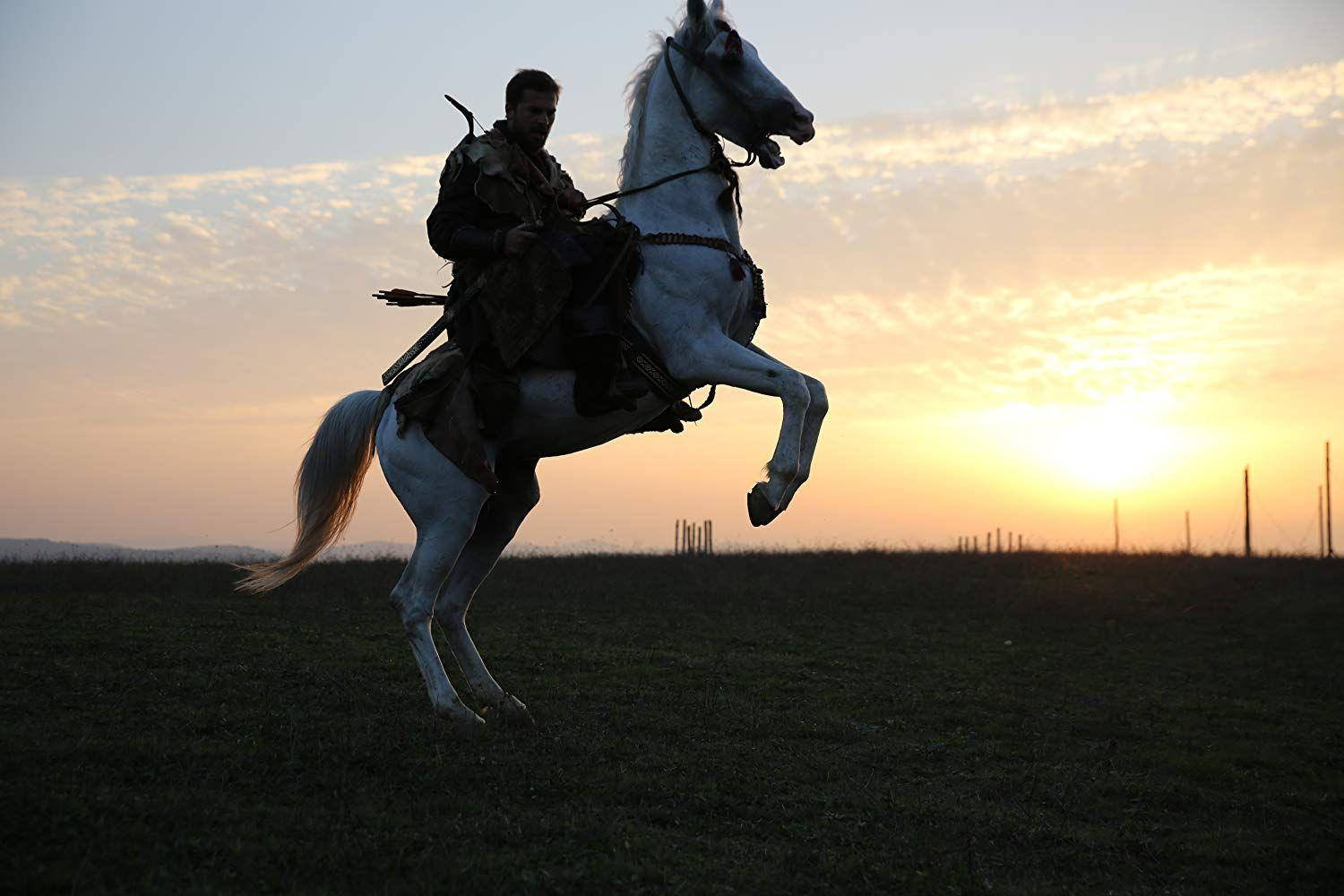 Ertugrul Gazi Riding His White Horse Background