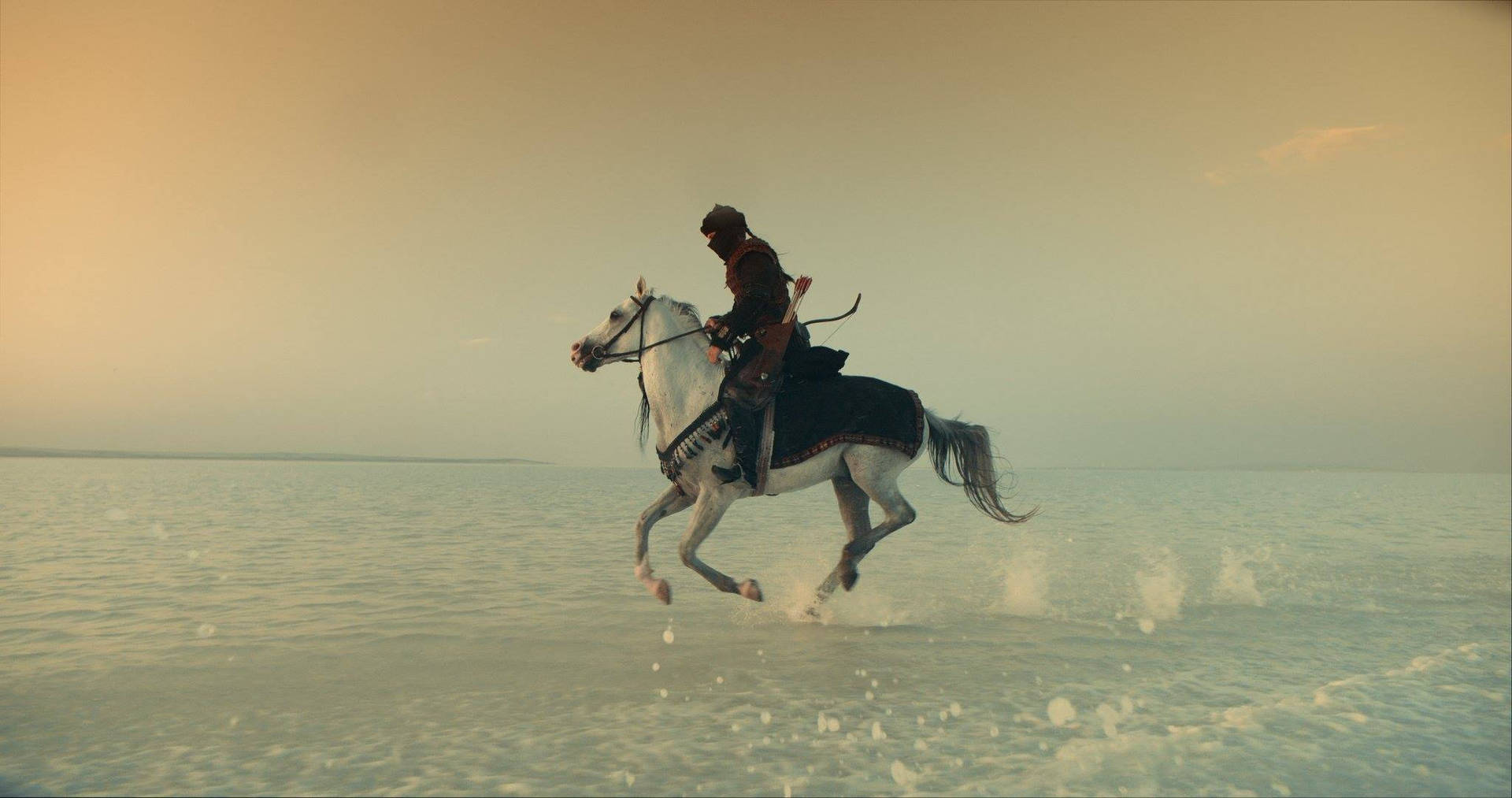 Ertugrul Gazi Riding Horse On Water Background