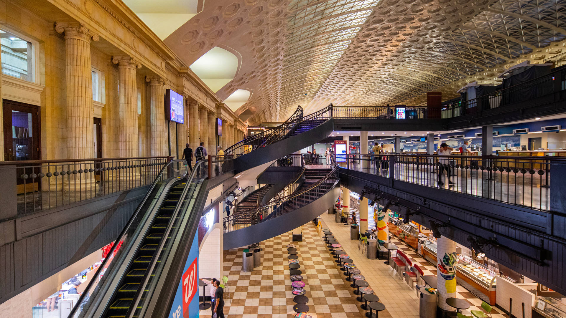 Escalators And Stairs In Union Station Background