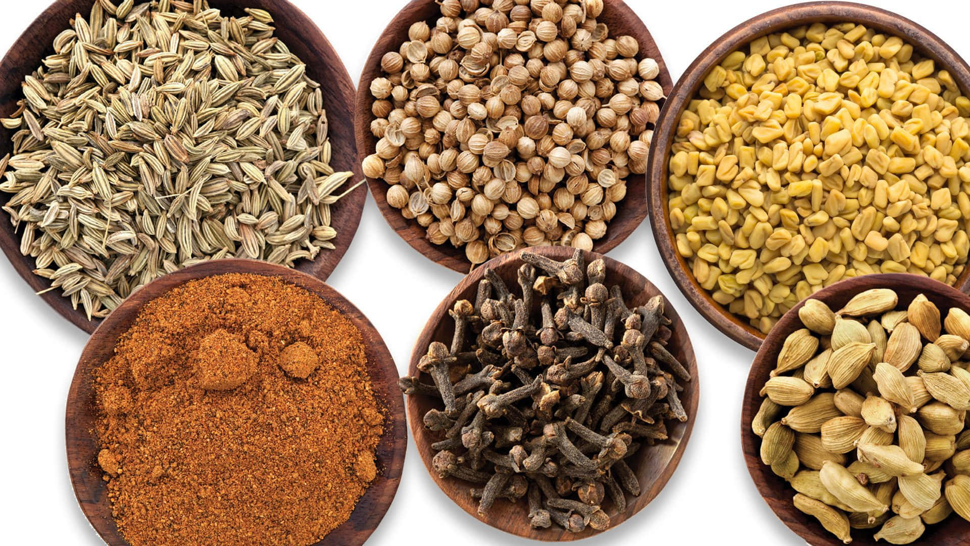 Essential Cooking Spices On Wooden Bowls