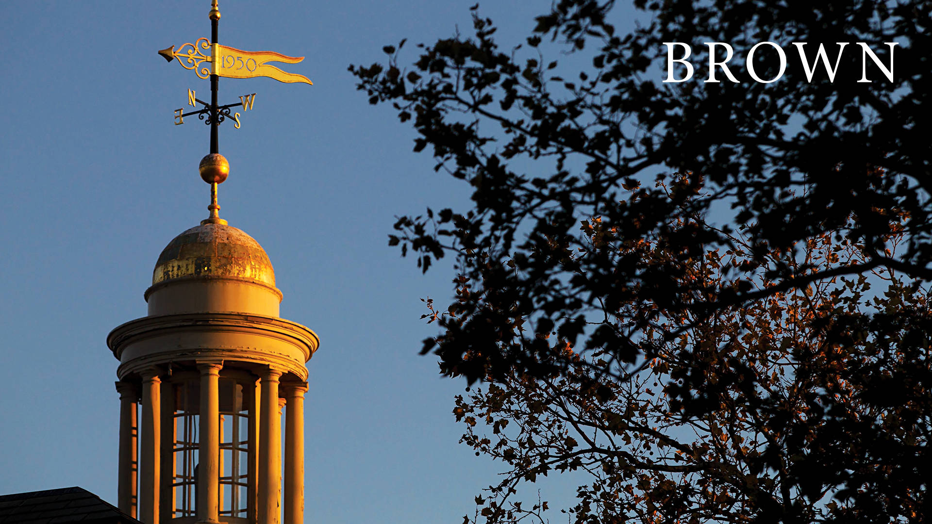 Established Historical Compass At Brown University's Campus Background