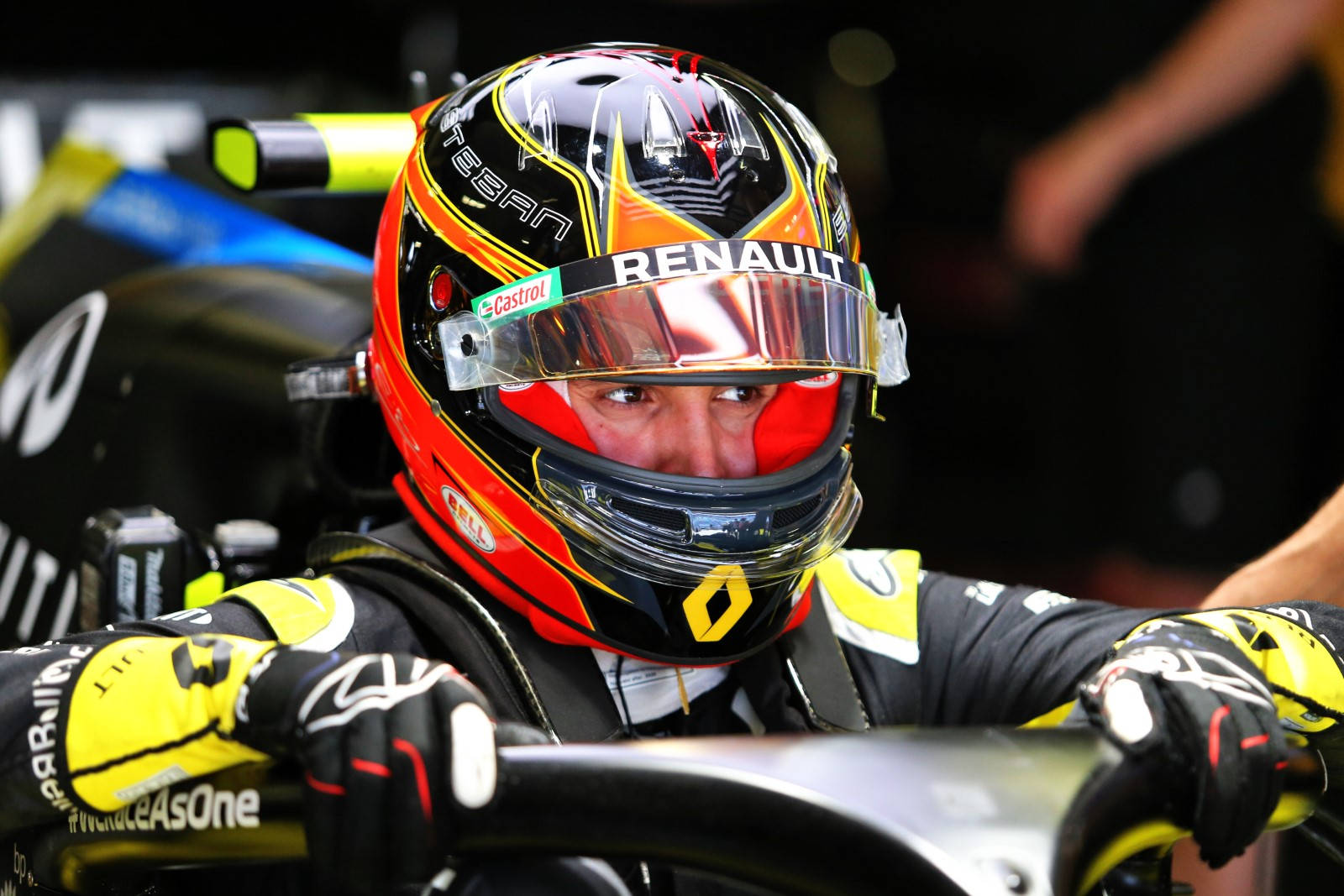 Esteban Ocon Expertly Piloting His Race Car Background