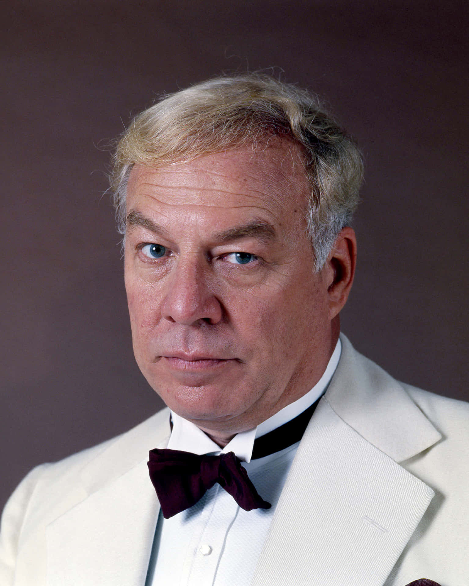 Esteemed Actor, George Kennedy In A Classic Pose Background