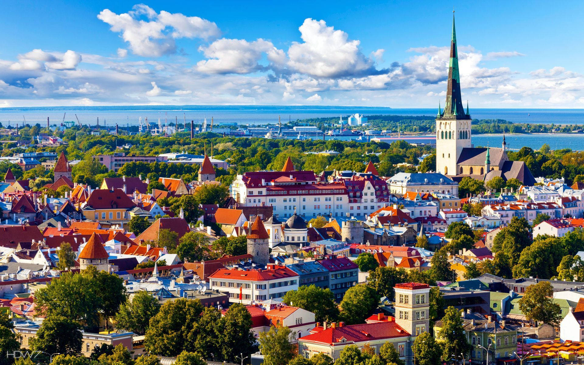 Estonia Cloudy And Vibrant City Background