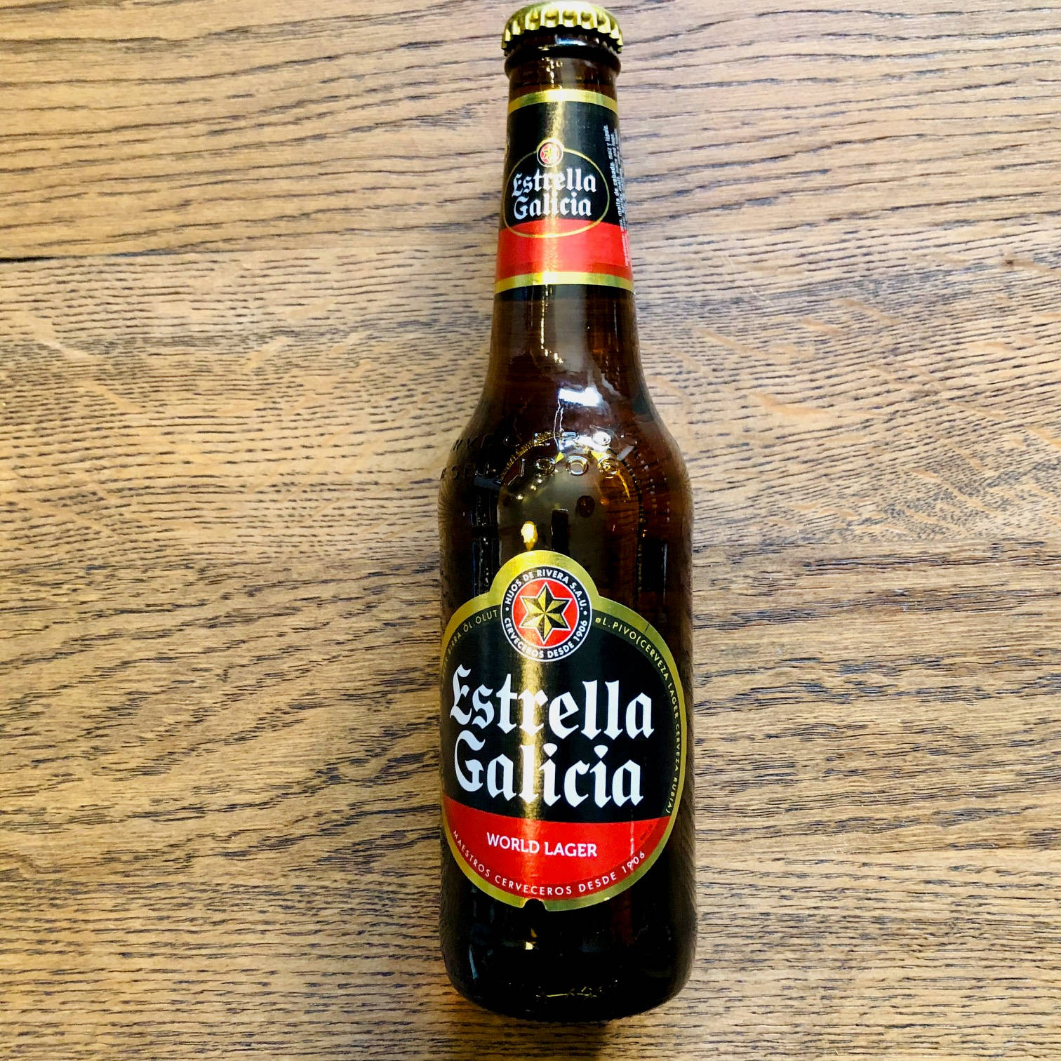 Estrella Galicia In A Dark Brown Bottle Background