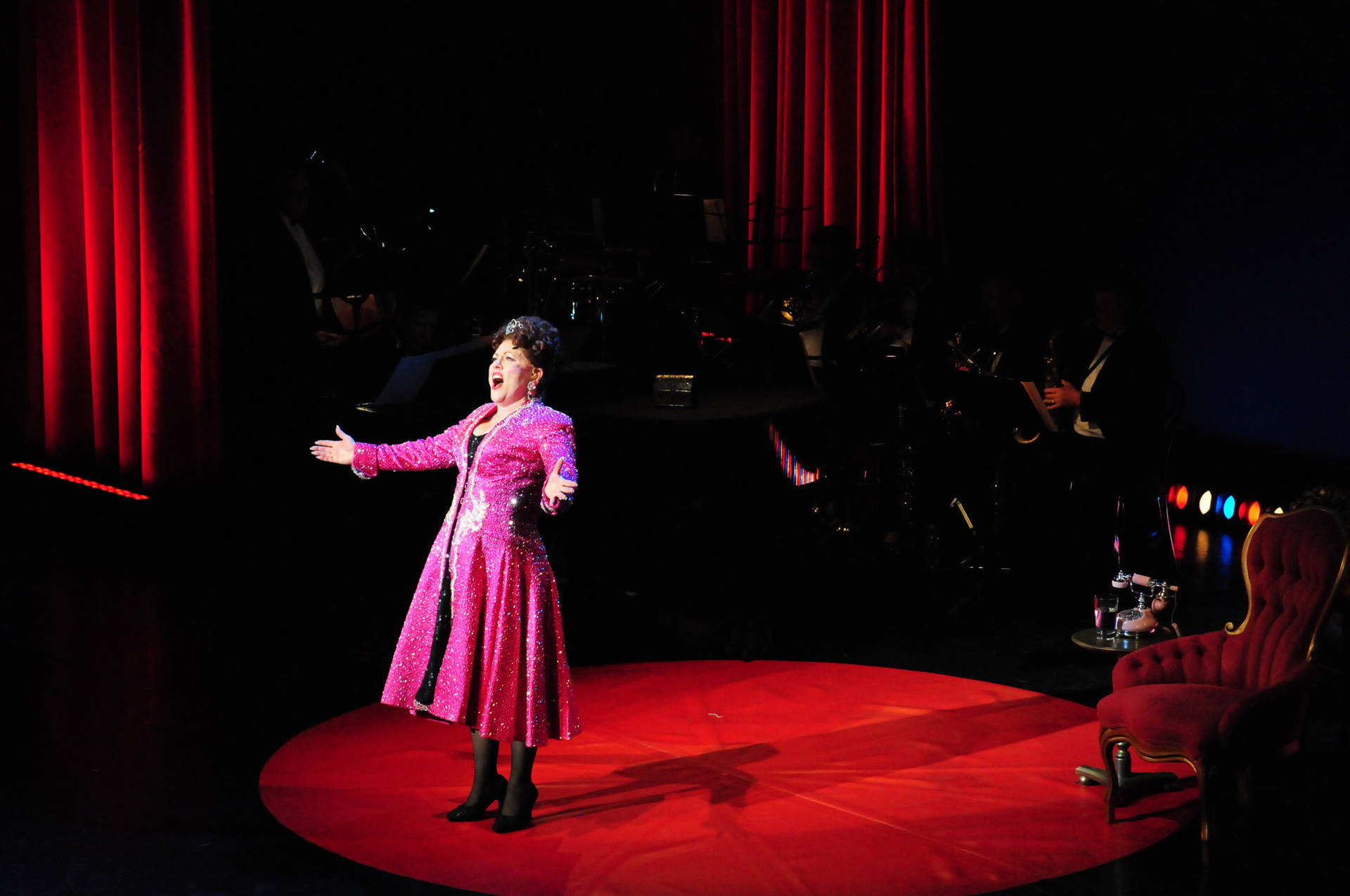 Ethel Merman Singing On Small Red Stage Background