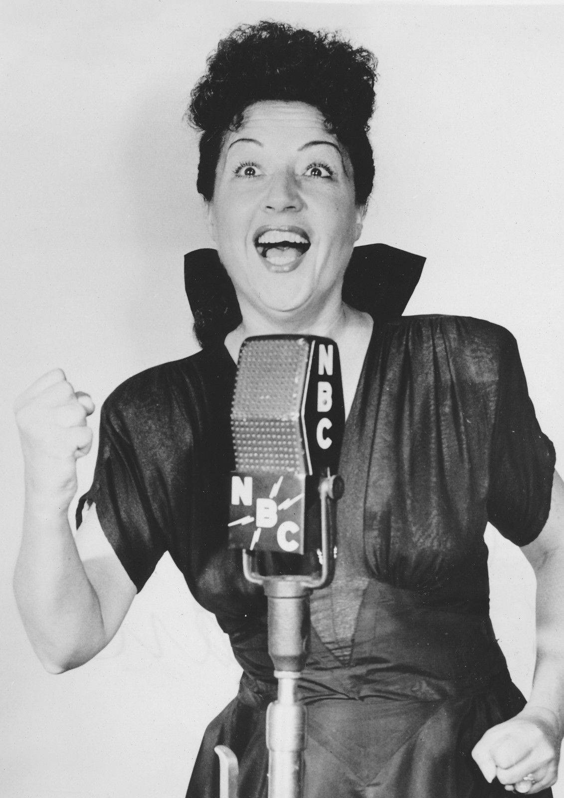 Ethel Merman Singing With A Large Microphone Background