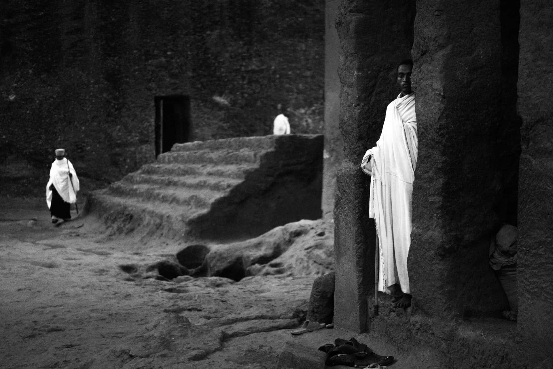 Ethiopian Orthodox Christians In The Walls Of Lalibela's Church Background