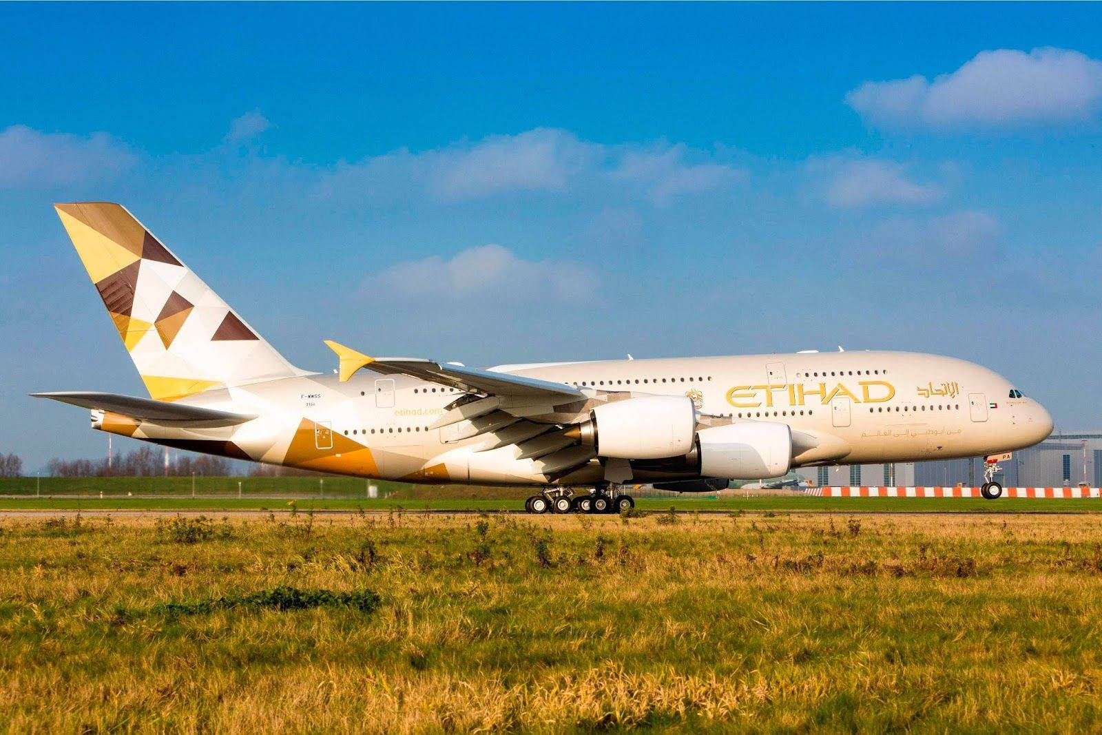 Etihad Airplane At Runway Background