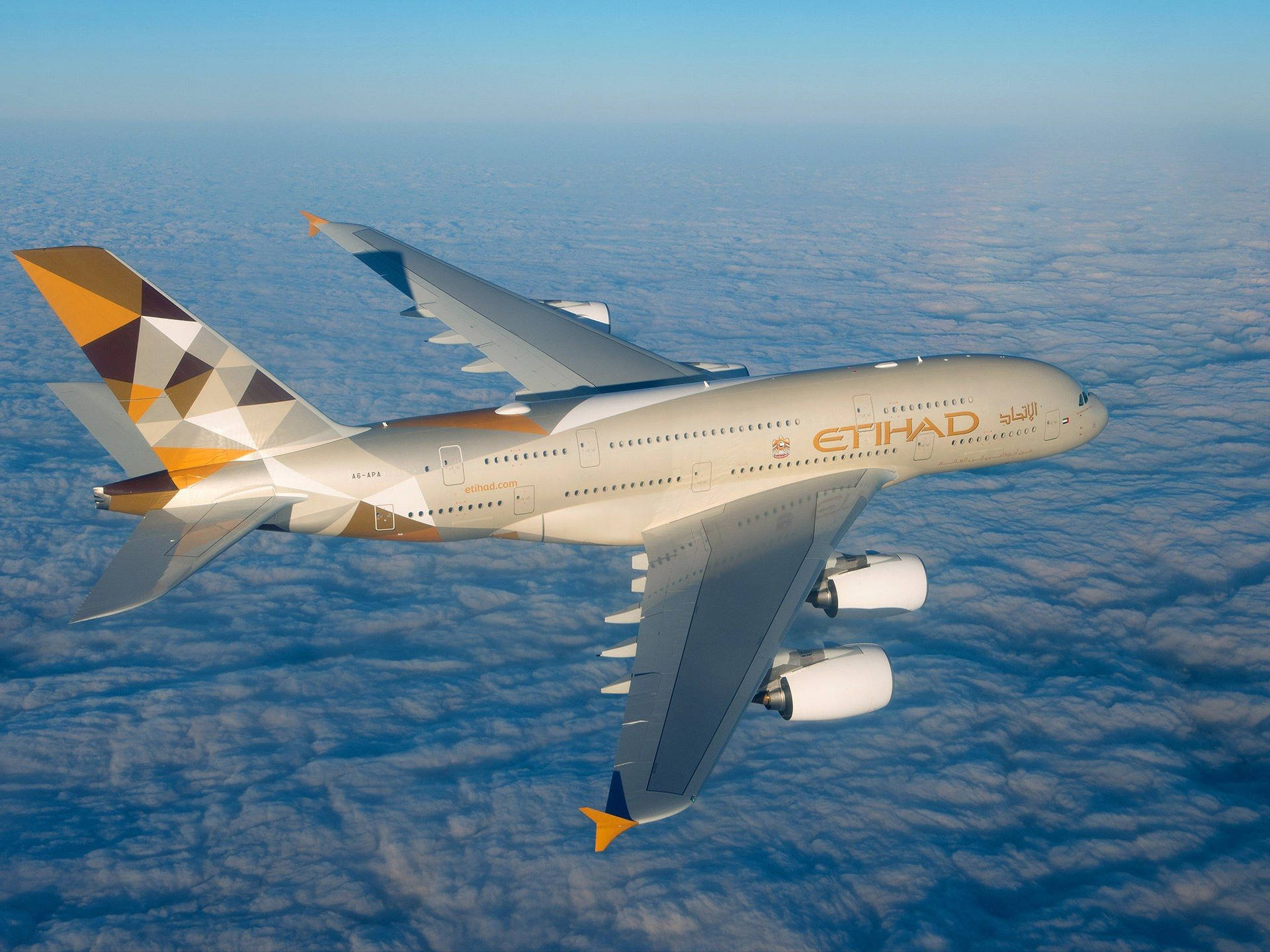 Etihad Airplane Flying In The Sky Background