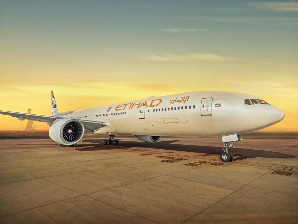 Etihad Airways Airplane At The Airport Background