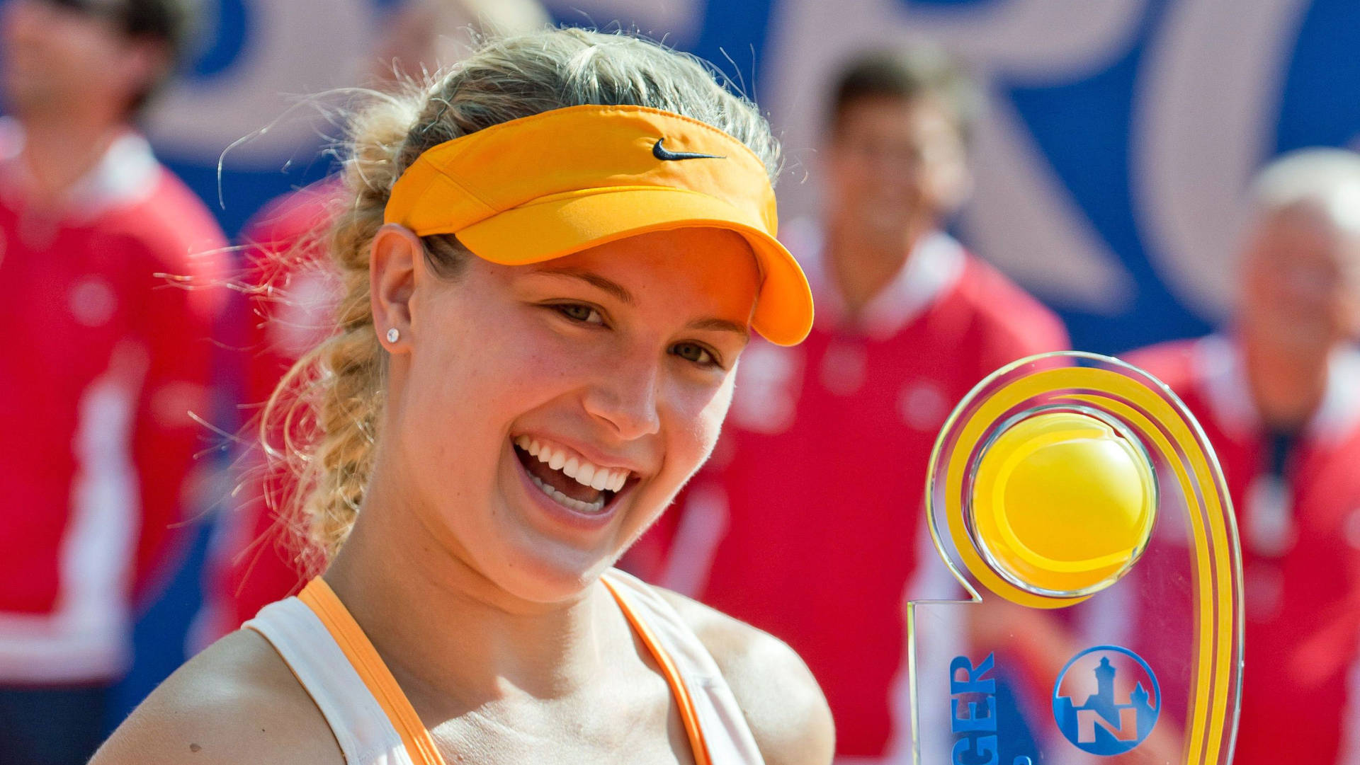 Eugenie Bouchard Smiling With Trophy Background